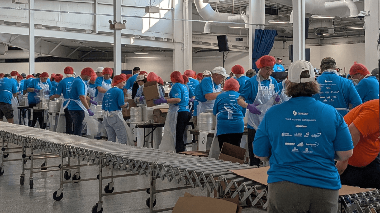  8th Annual Feed the Body, Feed the Soul packages over 250,000 pounds of rice